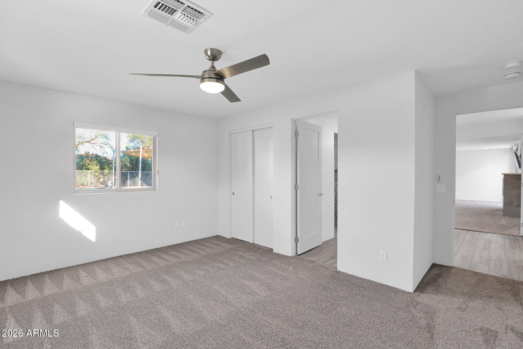 11813 North Blackheath Road Scottsdale, AZ 85254 - Photo 27 of 55 a view of an empty room with a window