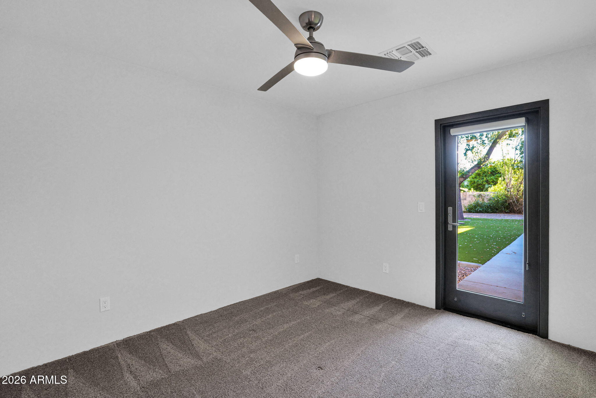 11813 North Blackheath Road Scottsdale, AZ 85254 - Photo 30 of 55 a view of an empty room with a window