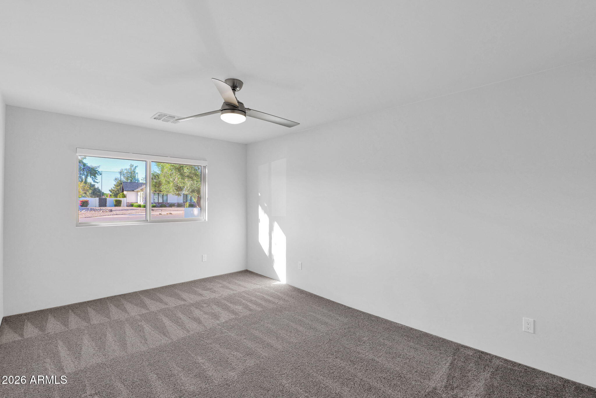 11813 North Blackheath Road Scottsdale, AZ 85254 - Photo 34 of 55 a view of an empty room with a window