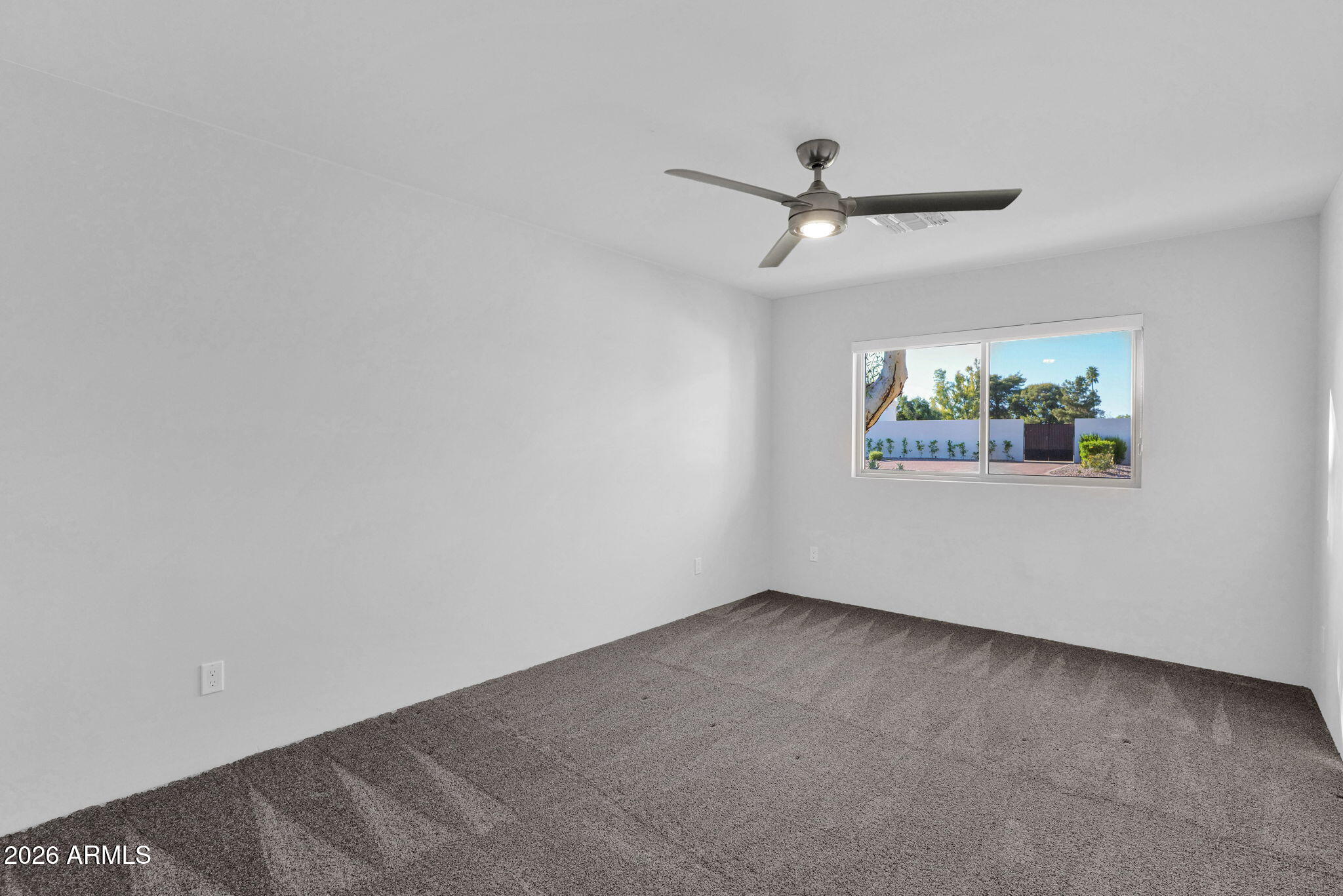 11813 North Blackheath Road Scottsdale, AZ 85254 - Photo 35 of 55 an empty room with windows