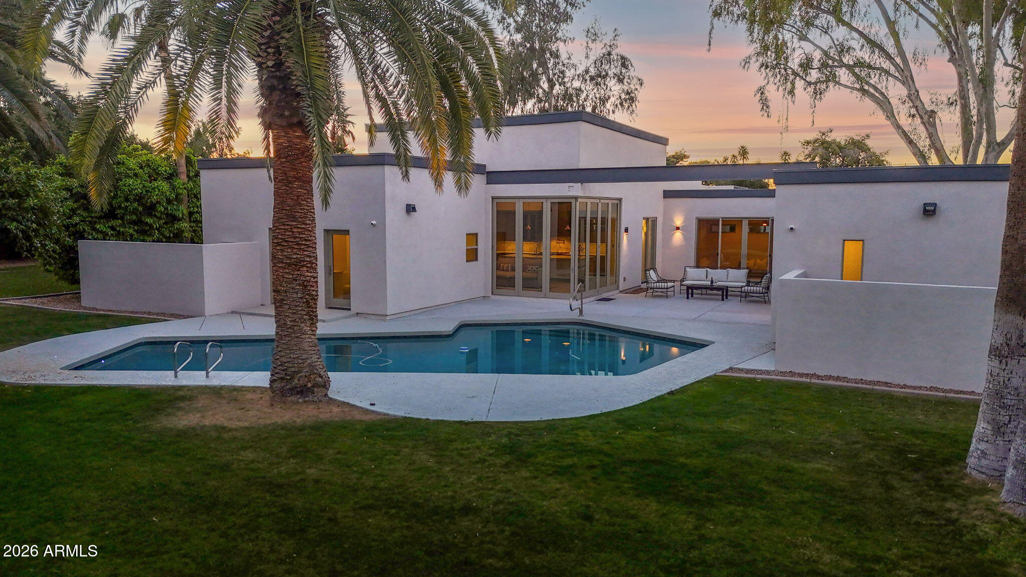 11813 North Blackheath Road Scottsdale, AZ 85254 - Photo 52 of 55 a view of a house with a swimming pool and a yard