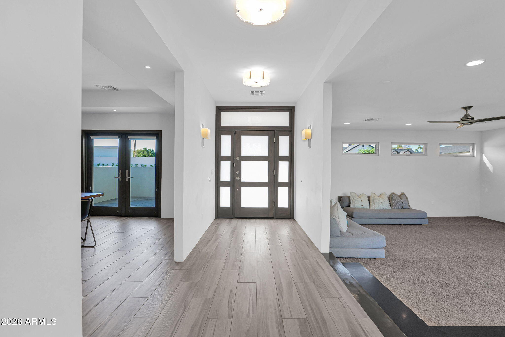 11813 North Blackheath Road Scottsdale, AZ 85254 - Photo 7 of 55 wooden floor in an empty room with a window
