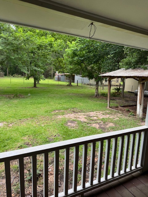 9004 Farm To Market 62 Corrigan, TX 75939 - Photo 2 of 27 a view of swimming pool from a balcony
