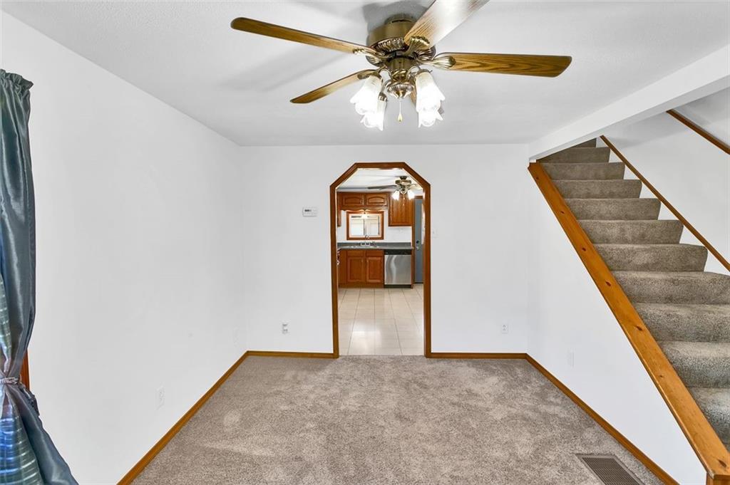 224 Trailer Boulevard Lower Burrell, PA 15068 - Photo 11 of 24 wooden floor in a hall with a window