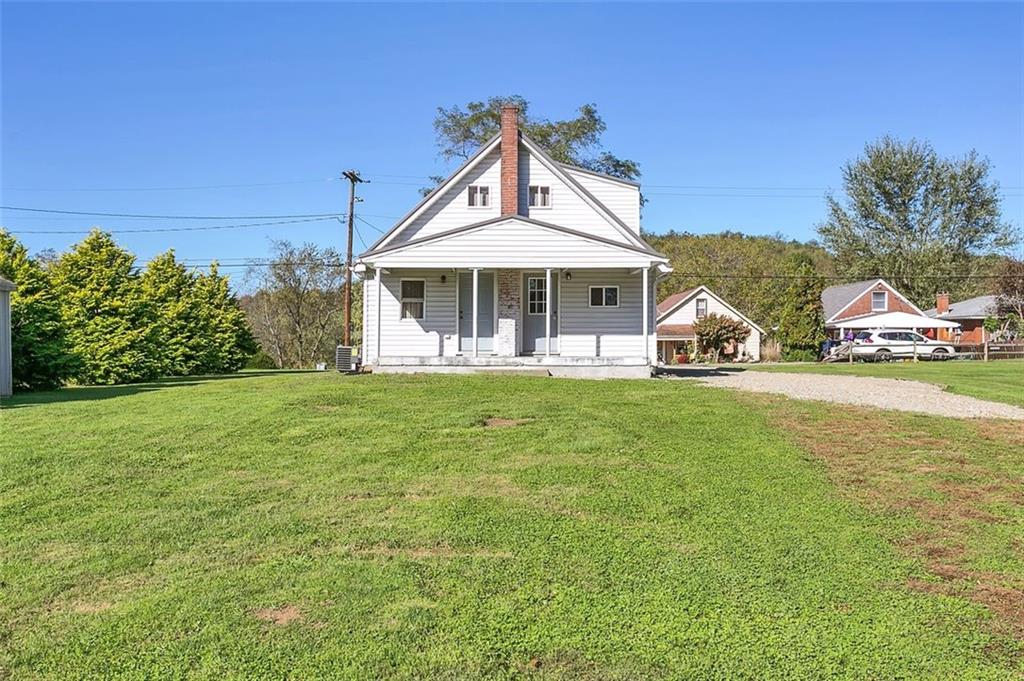 224 Trailer Boulevard Lower Burrell, PA 15068 - Photo 24 of 24 a front view of a house with garden