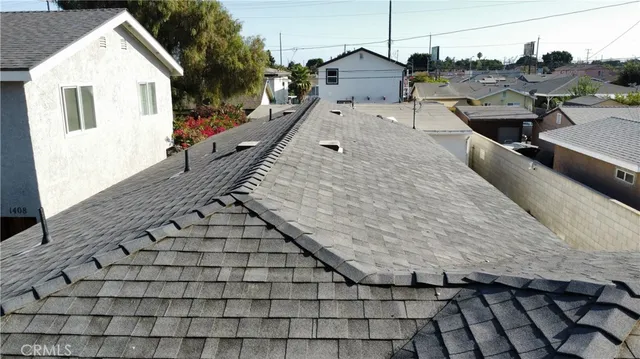 a view of a balcony with wooden floor