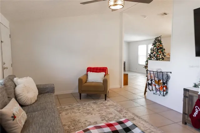 a living room with furniture and a couch