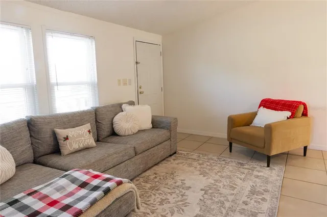 a kitchen with a sink and a mirror