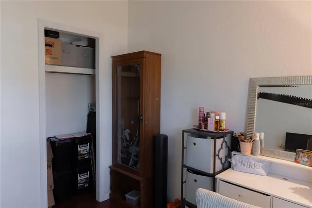 a workspace with furniture and a gate