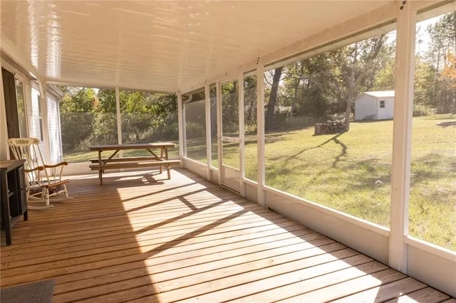 a view of a porch with furniture
