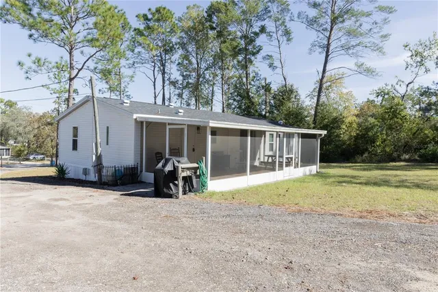 a house view with a garden space