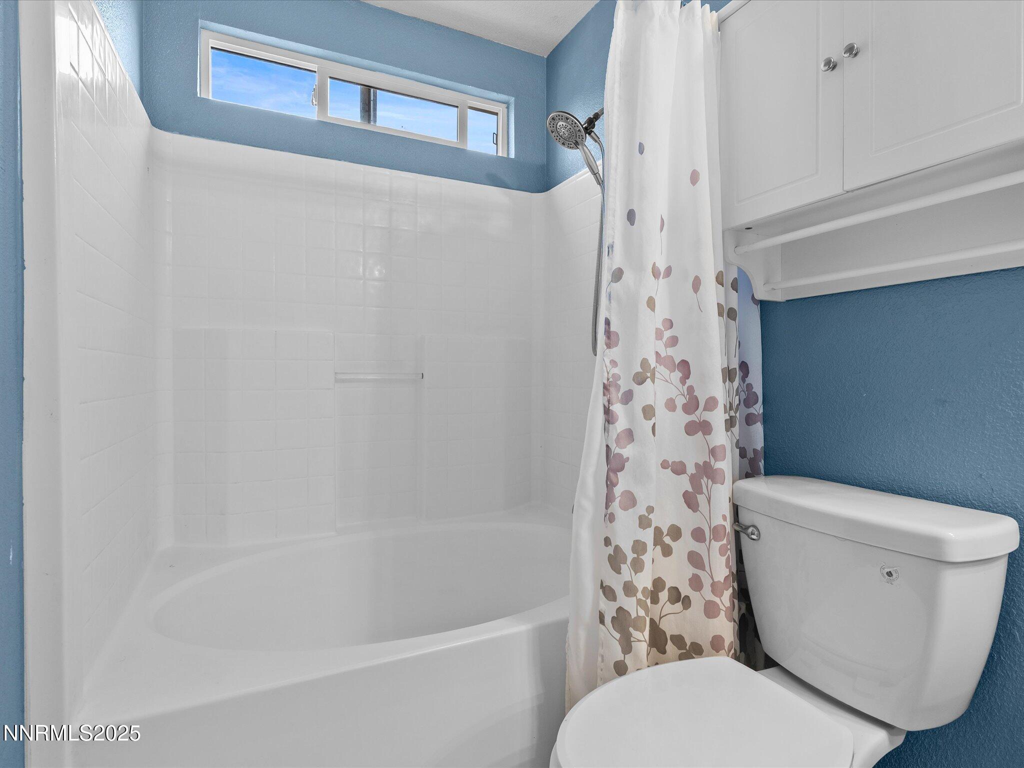 17795 Georgetown Drive Reno, NV 89508 - Photo 17 of 41 a white toilet sitting next to a bath tub