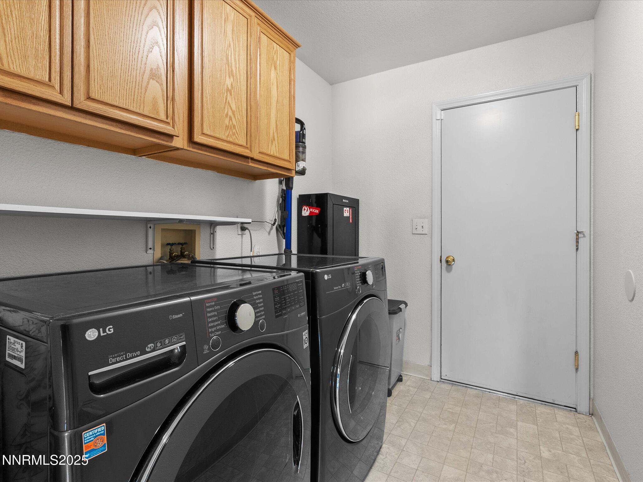 17795 Georgetown Drive Reno, NV 89508 - Photo 23 of 41 a utility room with dryer and washer