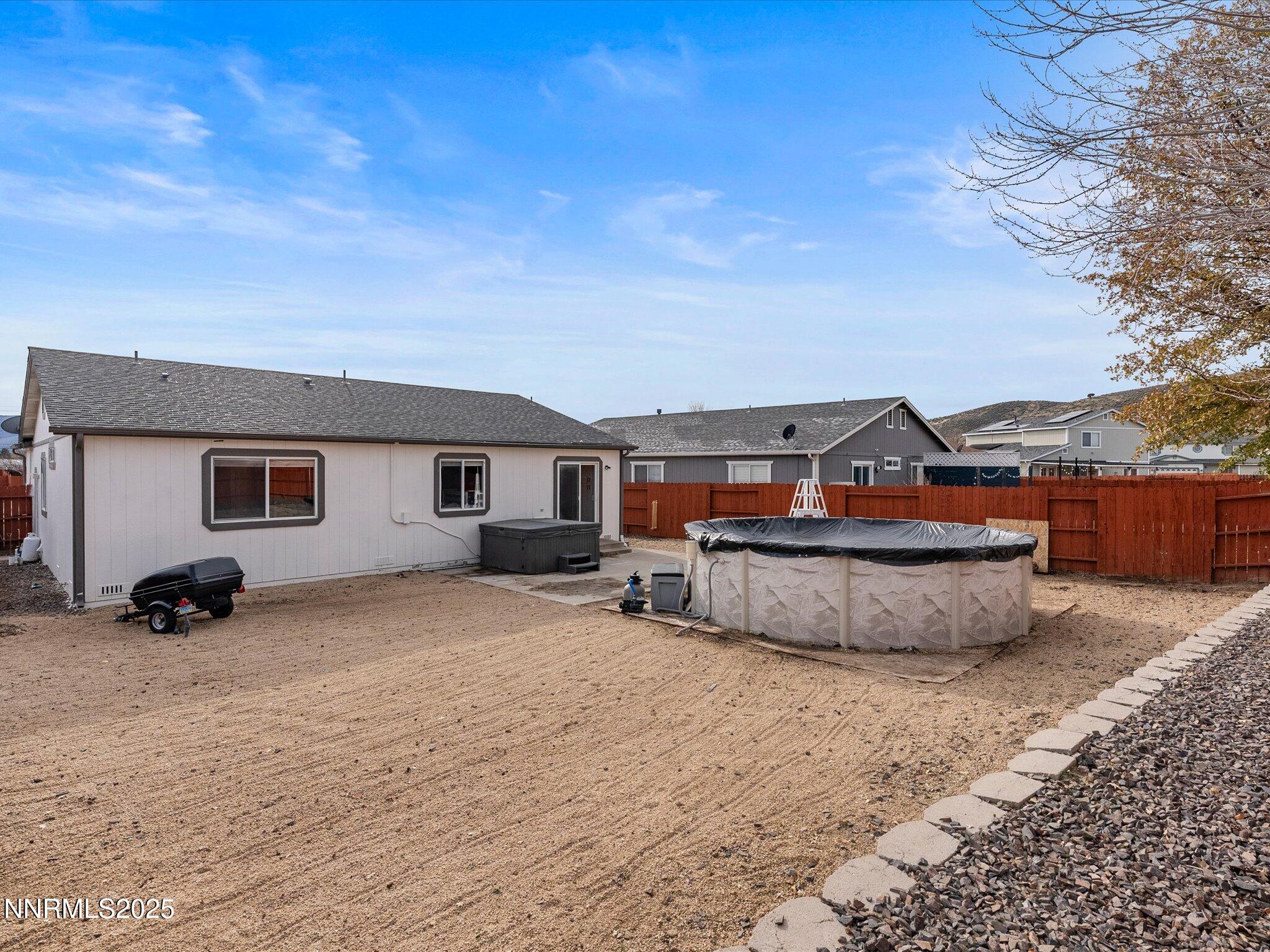 17795 Georgetown Drive Reno, NV 89508 - Photo 30 of 41 a view of a house with backyard and sitting area