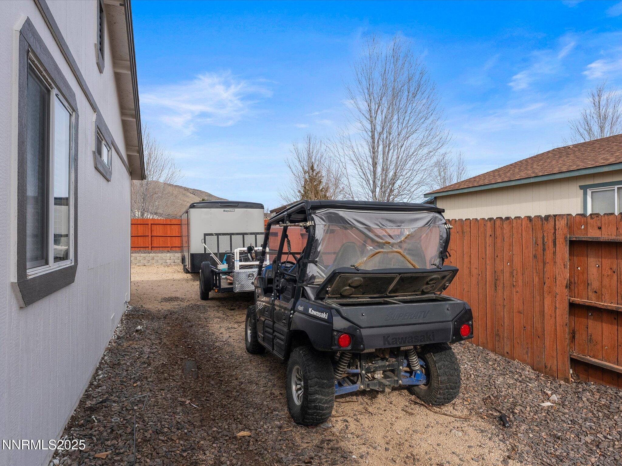 17795 Georgetown Drive Reno, NV 89508 - Photo 31 of 41 a backyard of a house with barbeque oven table and chairs