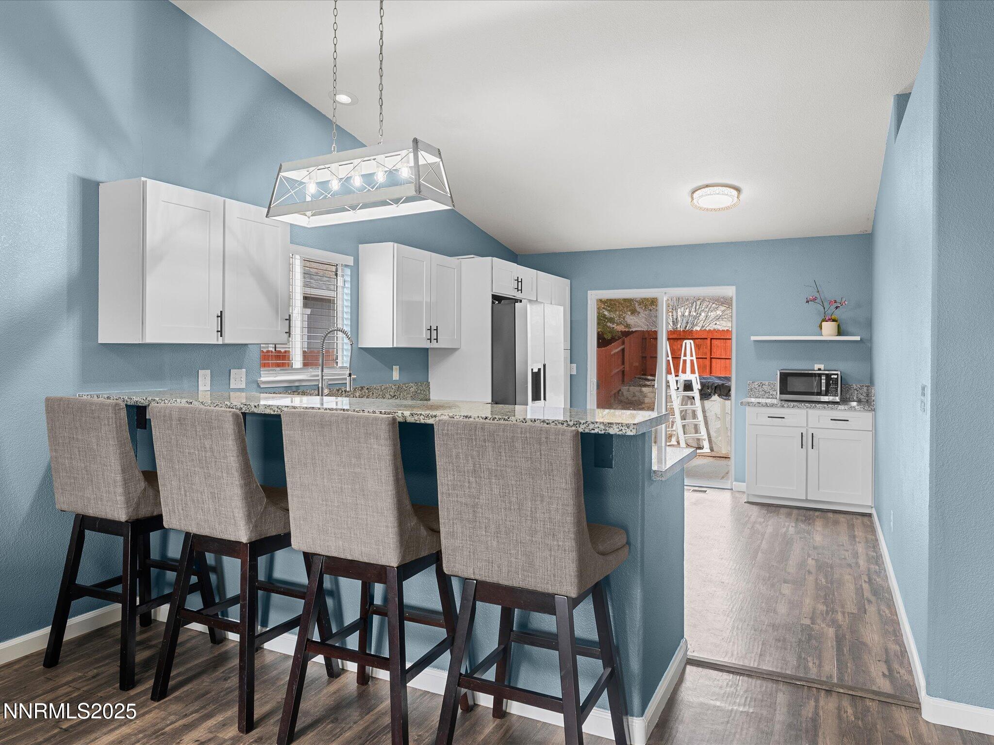 17795 Georgetown Drive Reno, NV 89508 - Photo 6 of 41 a view of kitchen with breakfast area