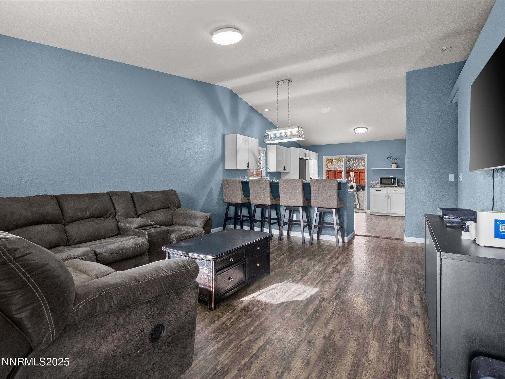 17795 Georgetown Drive Reno, NV 89508 - Photo 9 of 41 a living room with furniture and a wooden floor