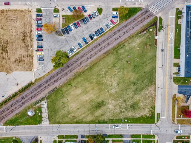 a view of swimming pool with a balcony