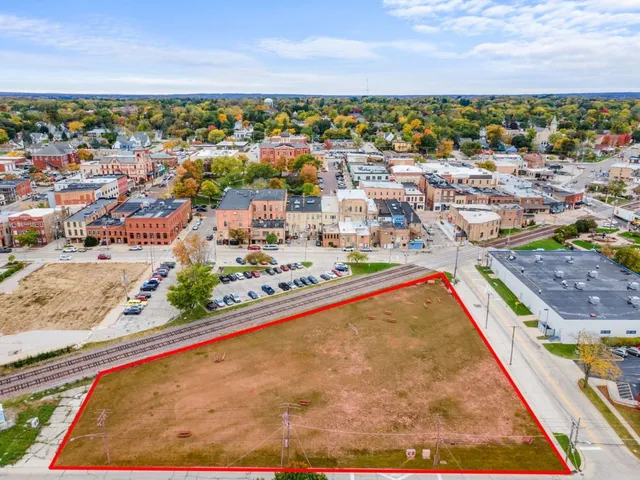 a view of a city with an ocean