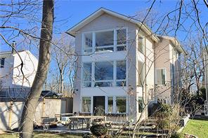 170 Soundview Avenue Rye, NY 10580 - Photo 1 of 1 a front view of a house with a yard