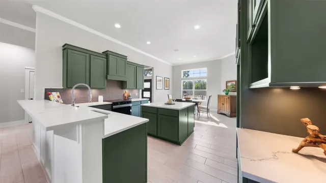 a kitchen with stainless steel appliances lots of counter top space