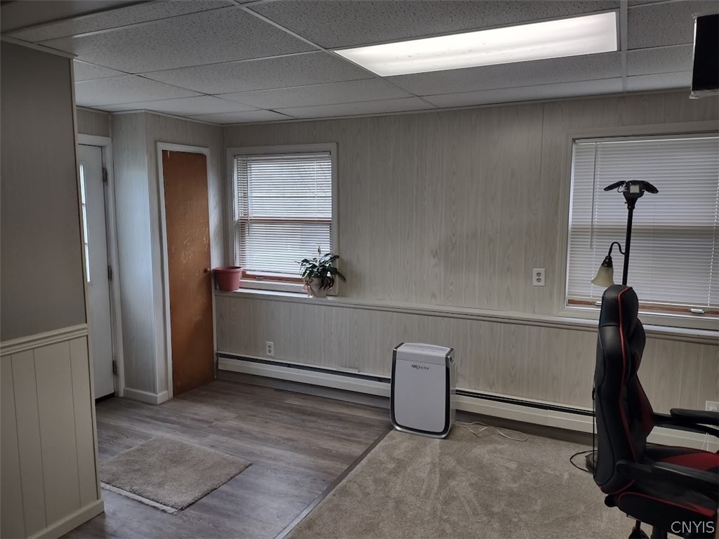 1085 Shackham Road Fabius, NY 13063 - Photo 30 of 46 Lower-level entry way with a great space for an office. Door to the left goes outside.