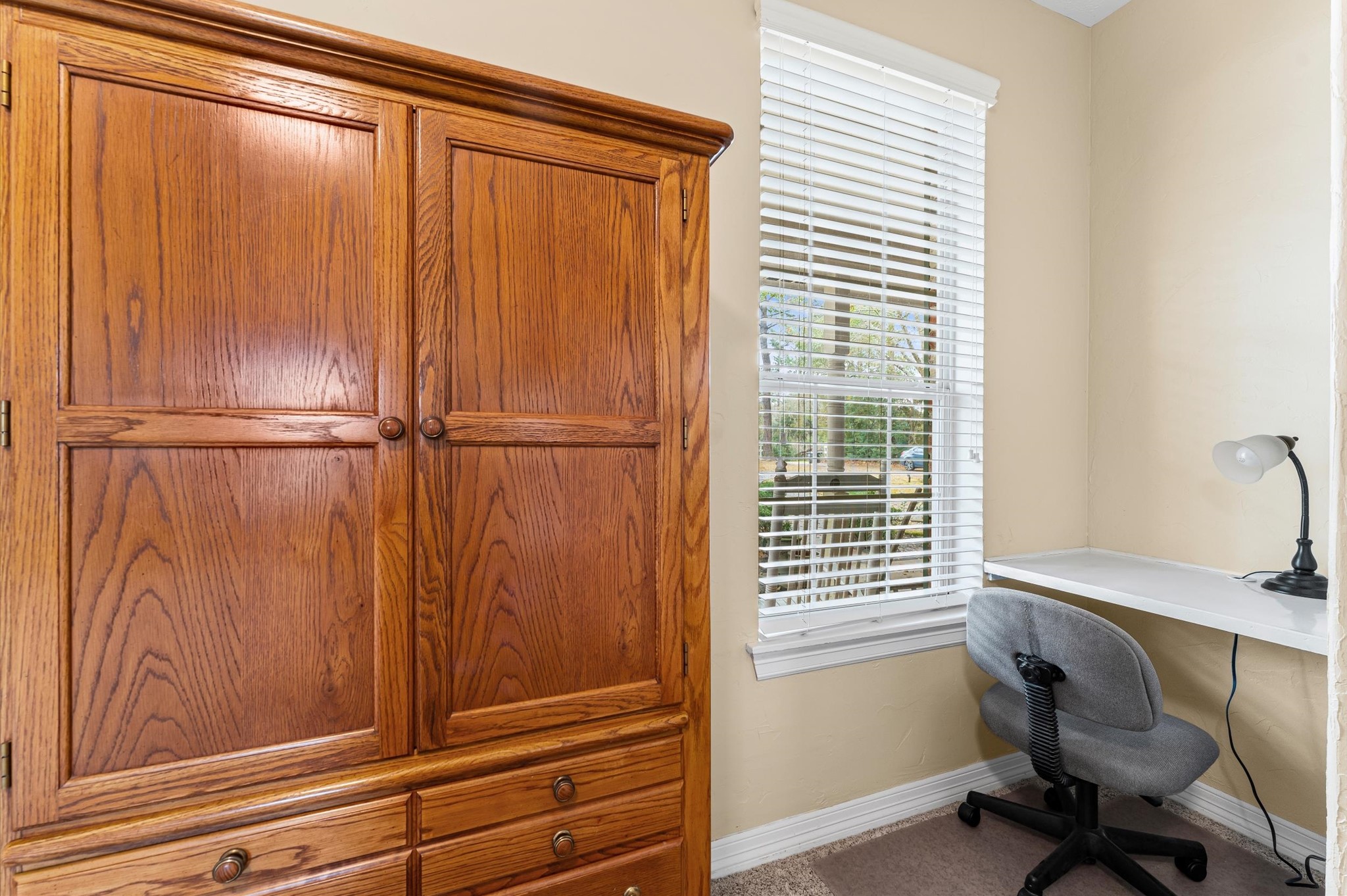 22625 Tomball Cemetery Road Tomball, TX 77377 - Photo 18 of 32 Cozy nook with natural light featuring a built-in desk, perfect for a small home office.