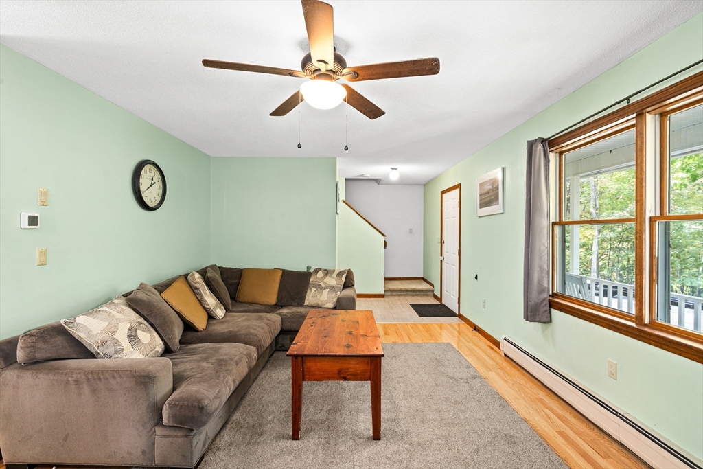 634 Burts Pit Road Northampton, MA 01062 - Photo 18 of 42 a living room with furniture and a large window