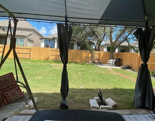 a view of swimming pool from a balcony