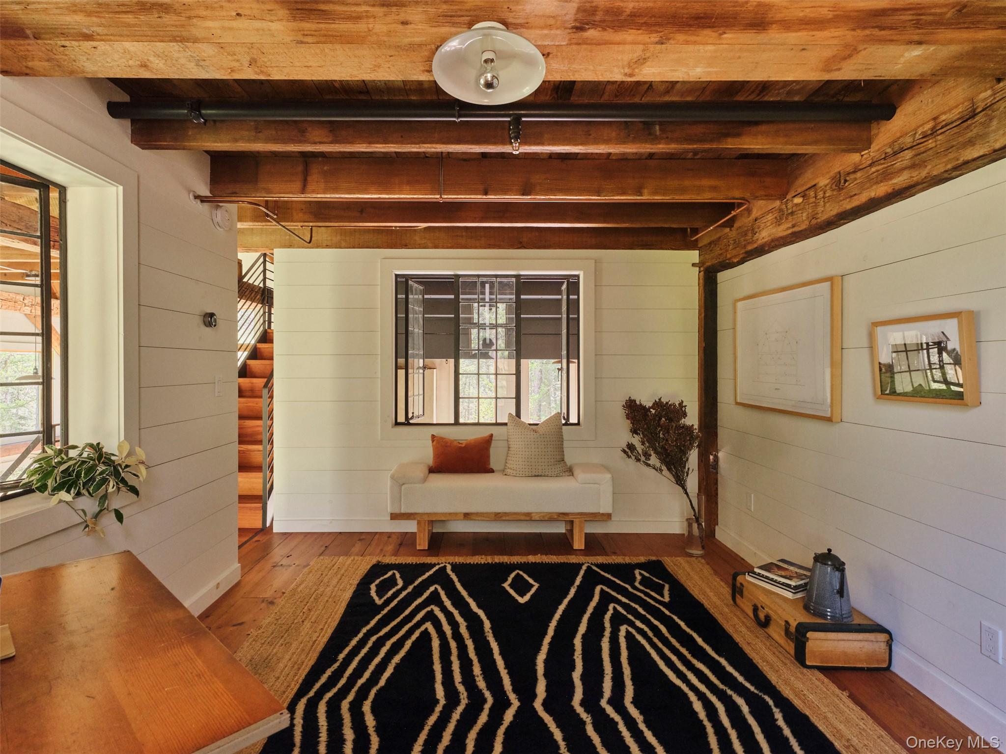 55 Woods Road Barryville, NY 12719 - Photo 25 of 50 a view of a livingroom with furniture and hardwood floor