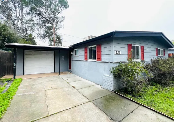 a front view of house with yard
