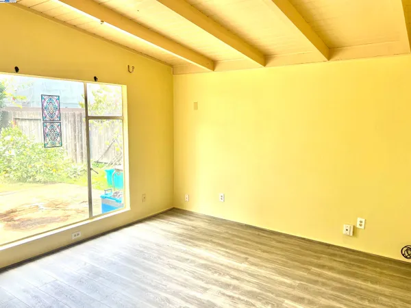 a view of an empty room and window