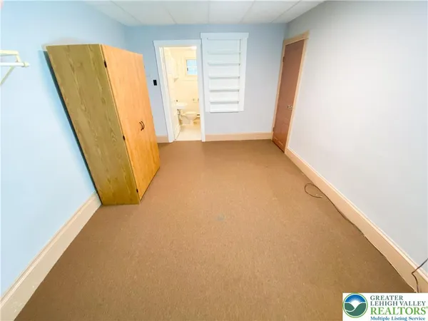 a view of hallway with a large window