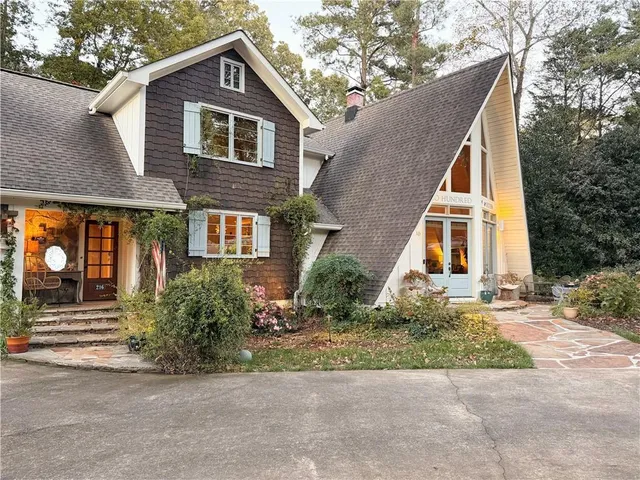 a view of a park with large trees