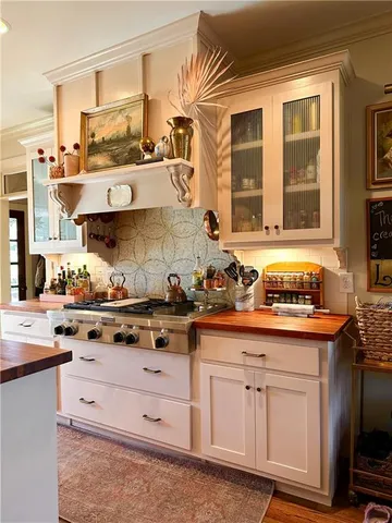 a room with a bed and a flat screen tv