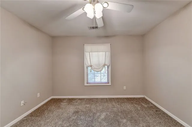 an empty room that has a window