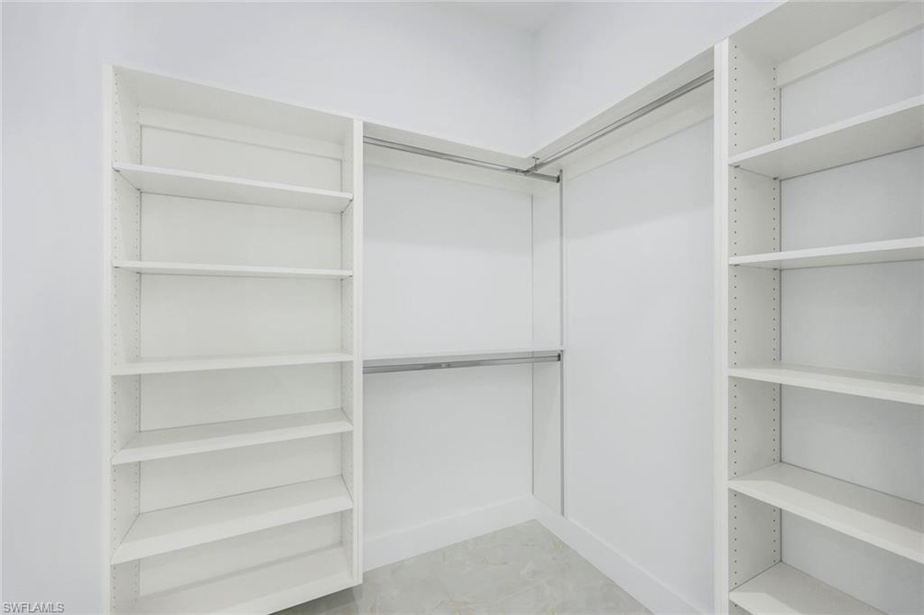 1312 Trail Terrace Drive Naples, FL 34103 - Photo 12 of 33 a view of an empty walk in closet