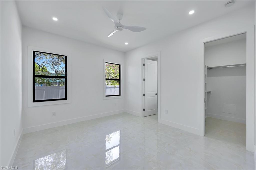 1312 Trail Terrace Drive Naples, FL 34103 - Photo 15 of 33 a view of an empty room with a window