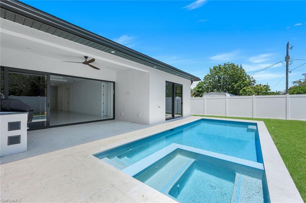 1312 Trail Terrace Drive Naples, FL 34103 - Photo 24 of 33 a view of backyard with sitting area