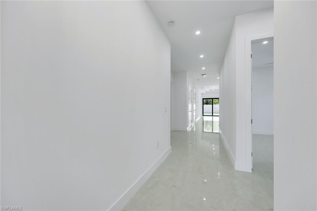 1312 Trail Terrace Drive Naples, FL 34103 - Photo 7 of 33 a view of a hallway