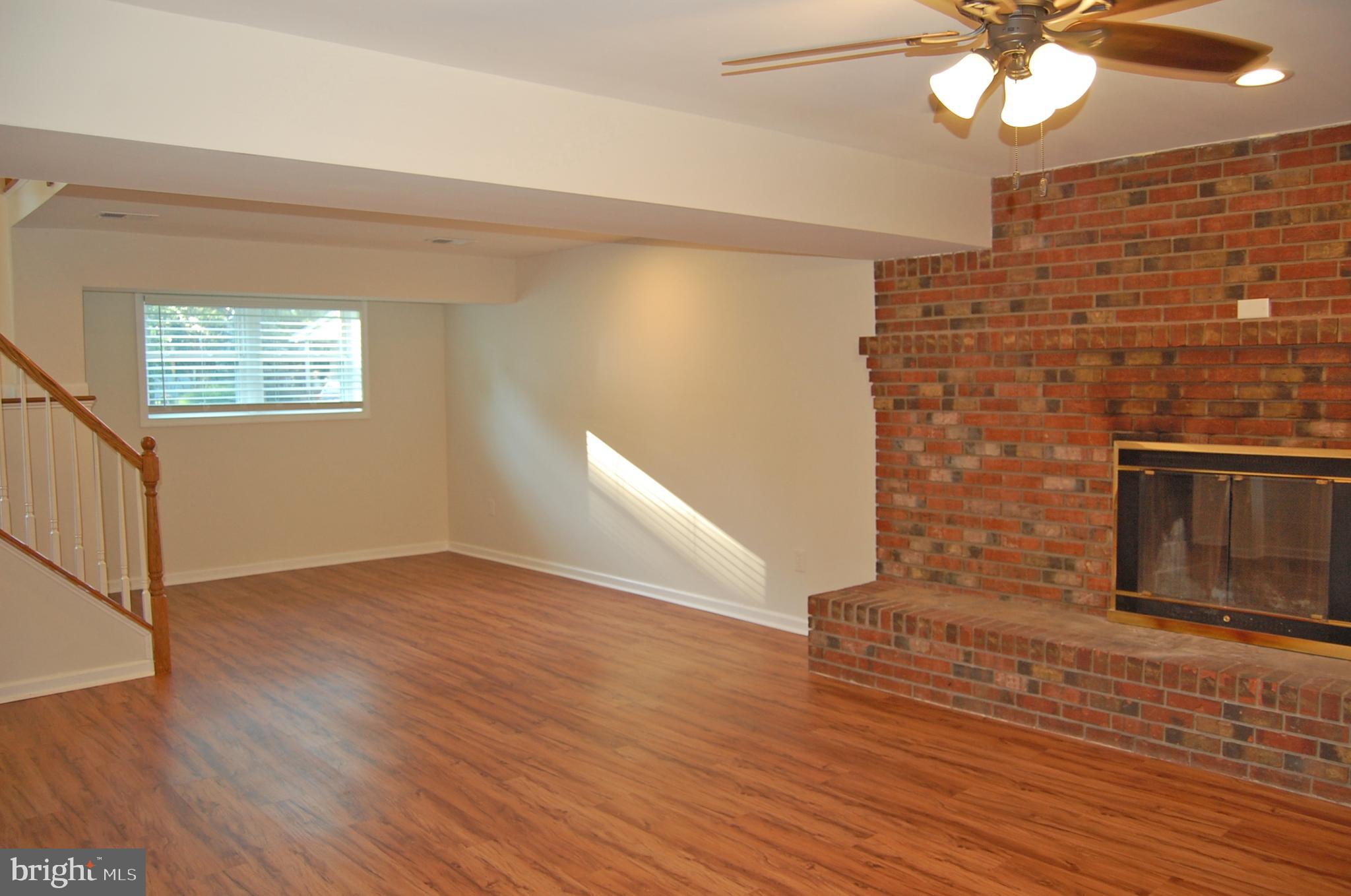 756 Stinchcomb Road Severna Park, MD 21146 - Photo 18 of 35 Spacious Family Room w/wood burning Fireplace