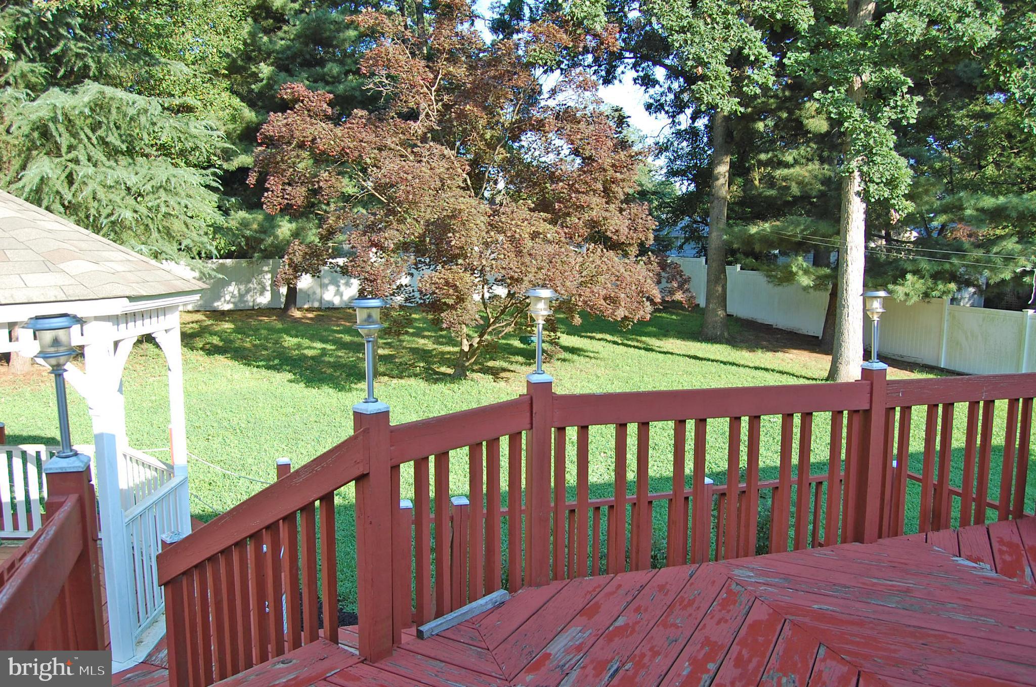 756 Stinchcomb Road Severna Park, MD 21146 - Photo 23 of 35 Spacious fully fenced rear yard w/deck off the DR