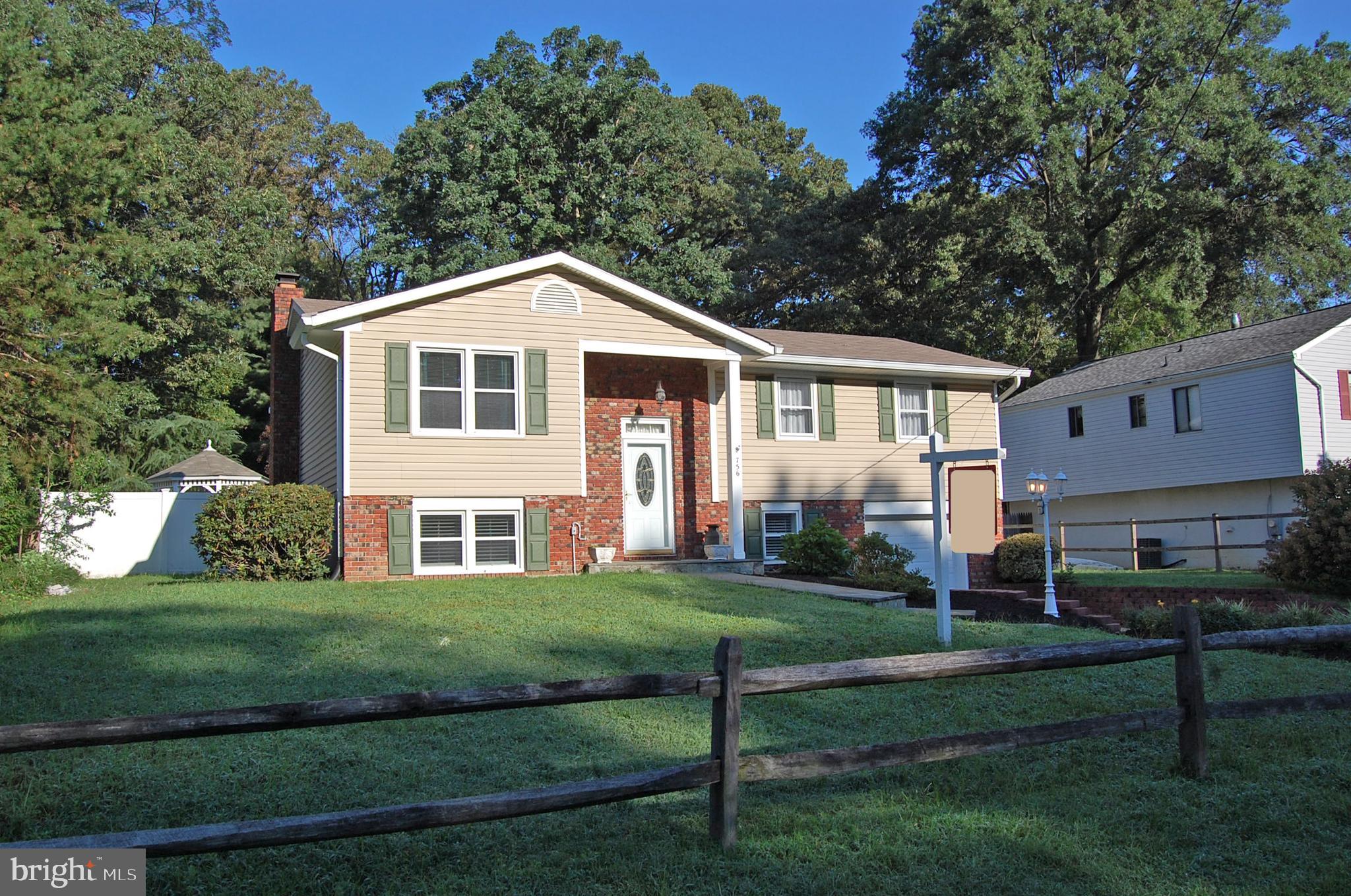 756 Stinchcomb Road Severna Park, MD 21146 - Photo 29 of 35 Front fencing with wood lap rails