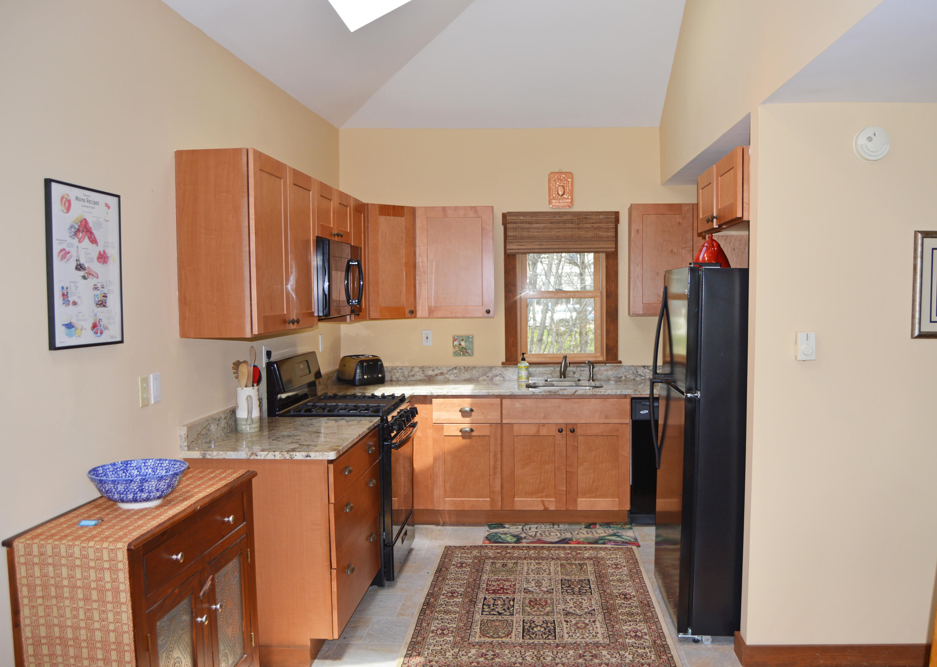 40 Clark Point Road Bernard, ME 04612 - Photo 9 of 32 DCCKitchenwithfridge