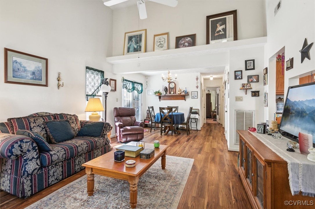 147 Rain Tree Way Williamsburg, VA 23188 - Photo 5 of 36 a living room with furniture and wooden floor