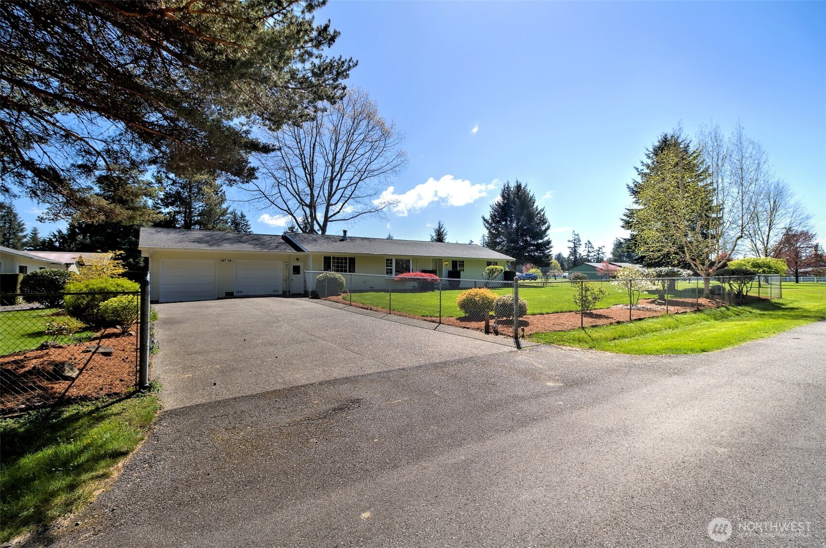 247-24 Woodard Road Chehalis, WA 98532 - Photo 1 of 40 a view of a house with swimming pool and sitting area