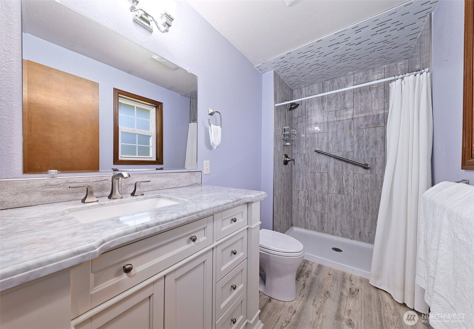 247-24 Woodard Road Chehalis, WA 98532 - Photo 18 of 40 a bathroom with a granite countertop sink toilet and shower