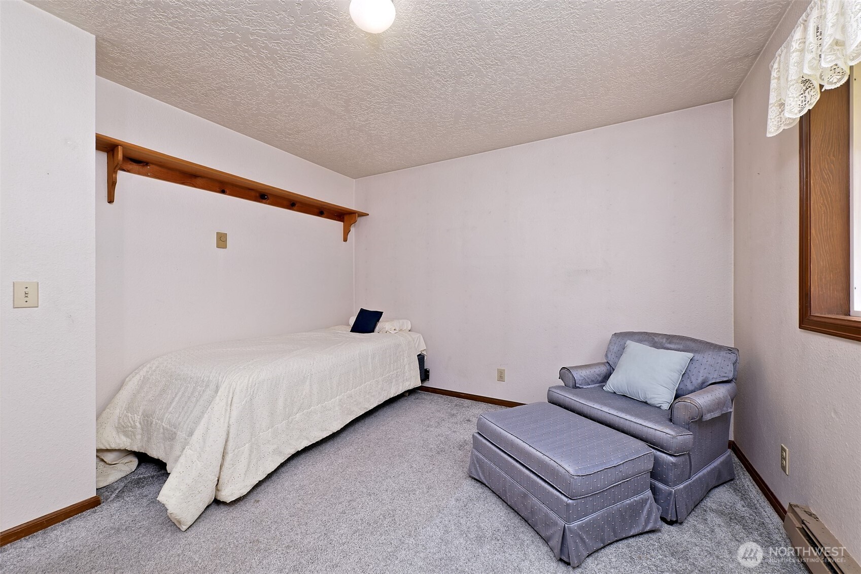 247-24 Woodard Road Chehalis, WA 98532 - Photo 19 of 40 a room with a bed and a couch