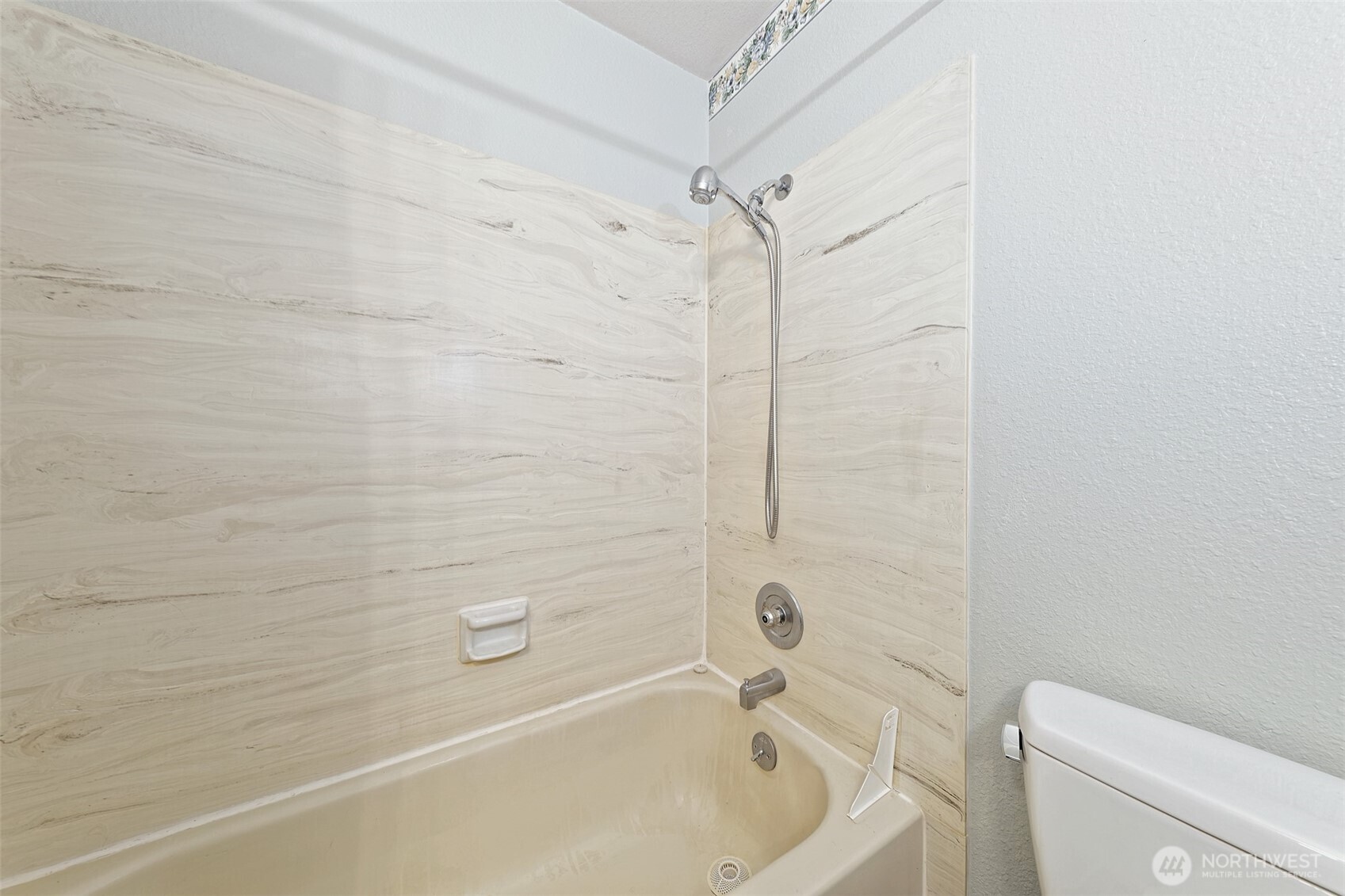 247-24 Woodard Road Chehalis, WA 98532 - Photo 21 of 40 a bathroom with a bathtub and a toilet
