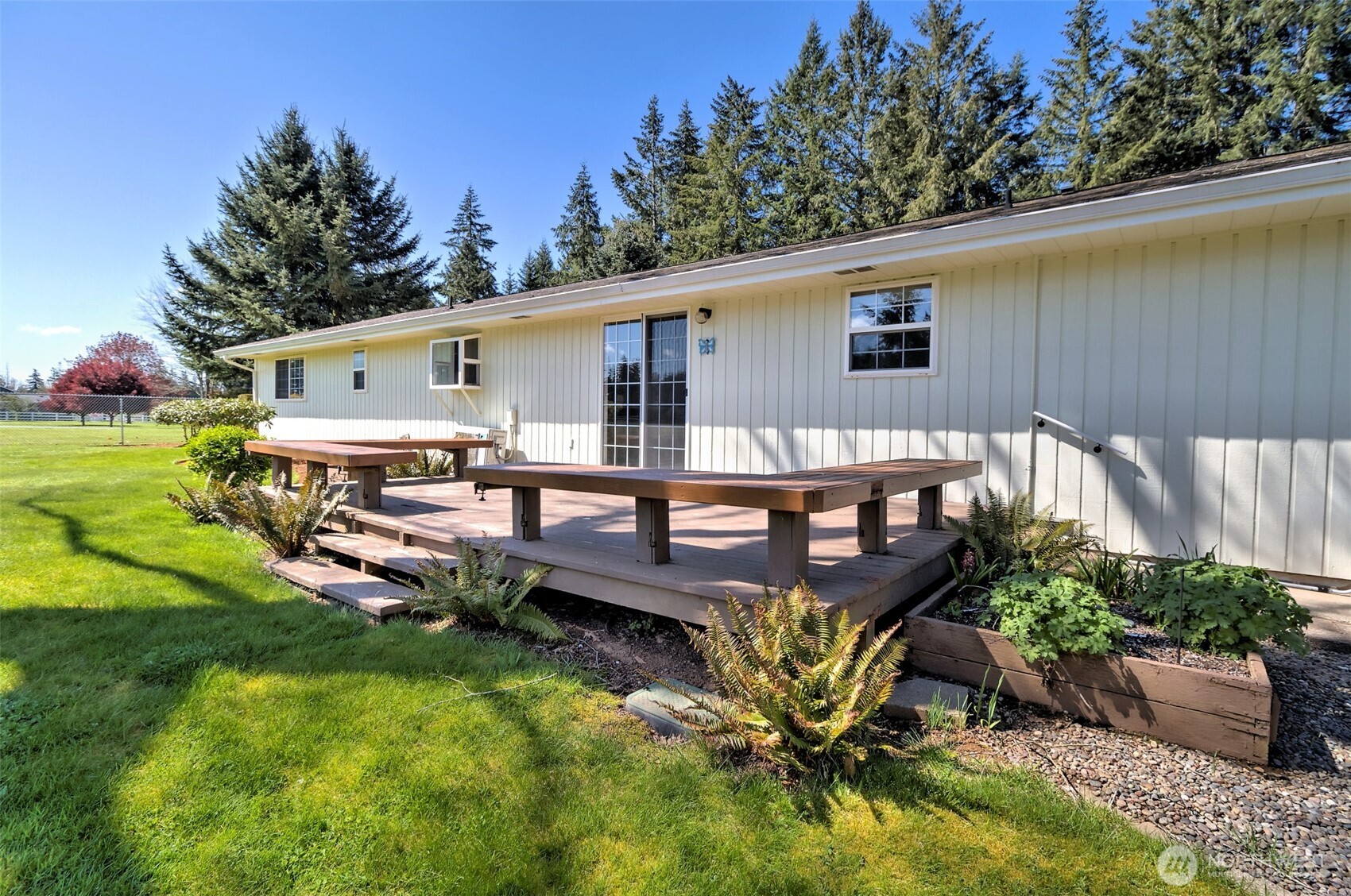 247-24 Woodard Road Chehalis, WA 98532 - Photo 26 of 40 a view of a backyard with plants and a patio